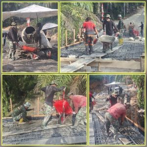 Bertarung dengan Terik, Prajurit Satgas TMMD Kokohkan Lantai Jembatan Demi Rakyat