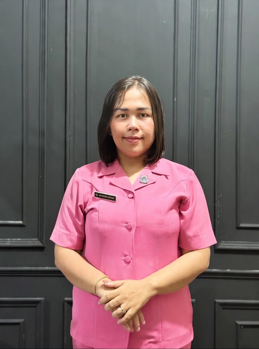 Teks foto : Korban Pemalsuan T.Tangan Ibu Bhayangkari Julita Amelia Br Sembiring