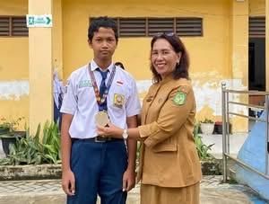 Siswa SMP Negeri 34 Medan Raih Medali Perak Kejuaraan Karate FORKI 2026