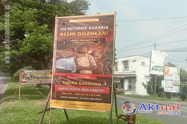Masyarakat Dalu X-A, Kamis (1/6/2026) siang kepada memasang spanduk protes dan desakan kepada BPN Deli Serdang, agar konflik lahan mereka segera diselesaikan.(Foto: Ist/Aktual Online)